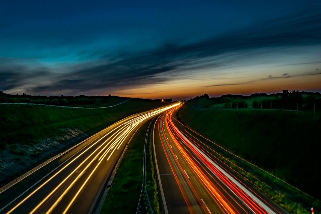 Lights of cars driving at night. Long exposure